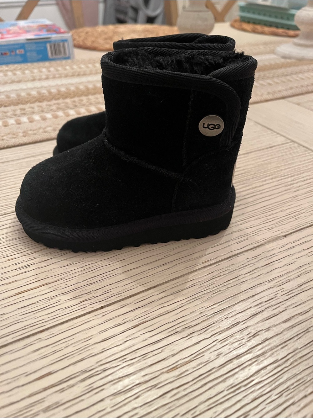 UGG Kids size 6 toddler Black Mini Boot with Shearling Trim